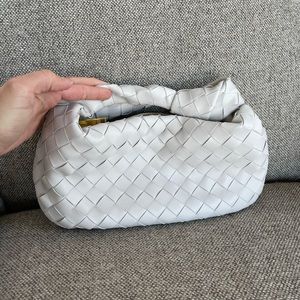 Chalk colored woven leather handbag